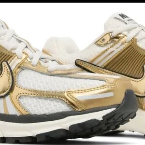 Nike Women's Metallic Gold and White Sneakers